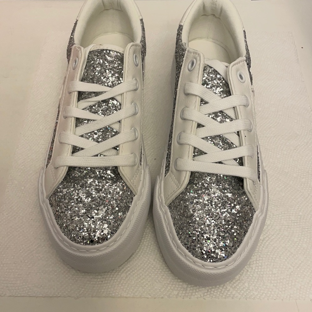 New Restricted stars silver sneakers.
